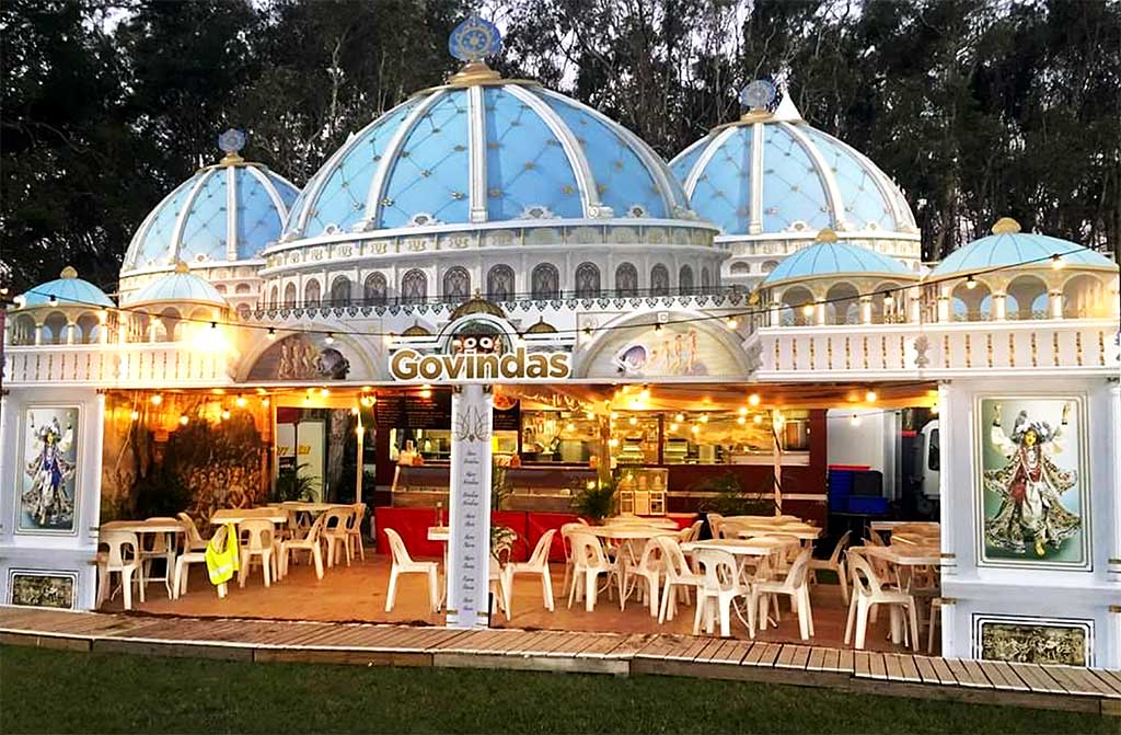 The Govindas Catering tent, masterminded by Krishna Gana dasa, is a replica of the Temple of the Vedic Planetarium being constructed in Mayapur, India.